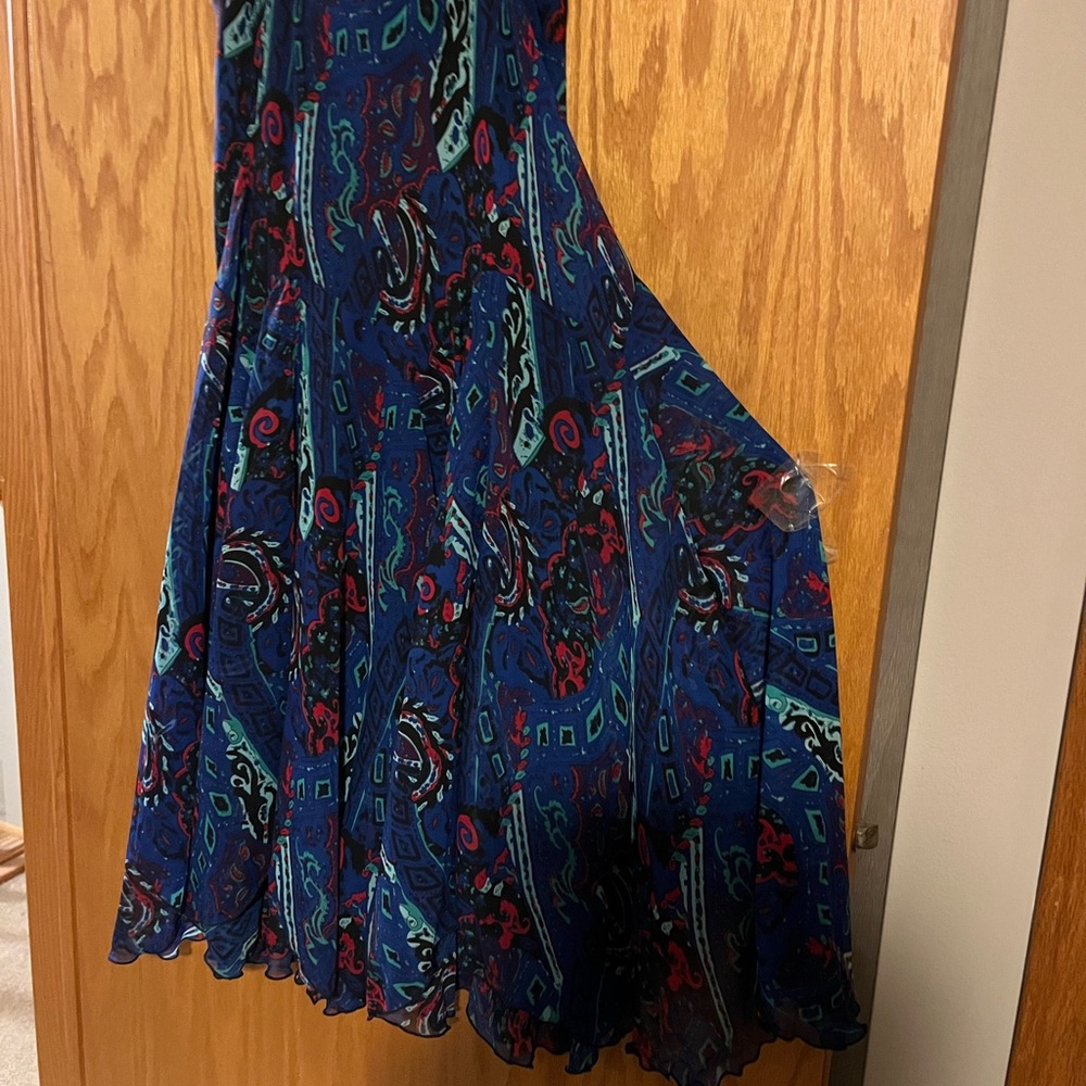 Newsworthy, black lined maxi-skirt with slightly ruffled hem.